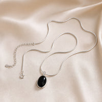 Elegant Black Oval White Gold Necklace
