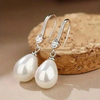 Dangling Earrings with Bright Pearls